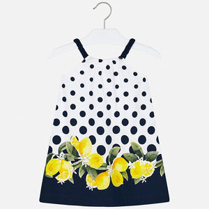 Mayoral Singapore Lemon Dress. This pretty white dress featuring a playful lemon print is perfect for sun-drenched days. The design includes an all-over polka dot and lemon print.